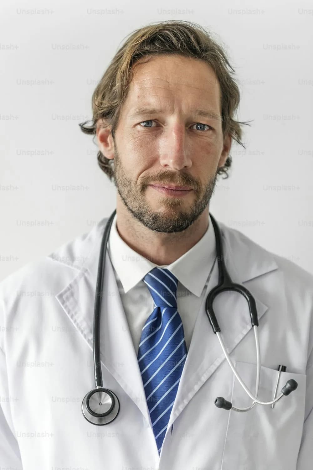 Portrait of a physician in medical attire with stethoscope